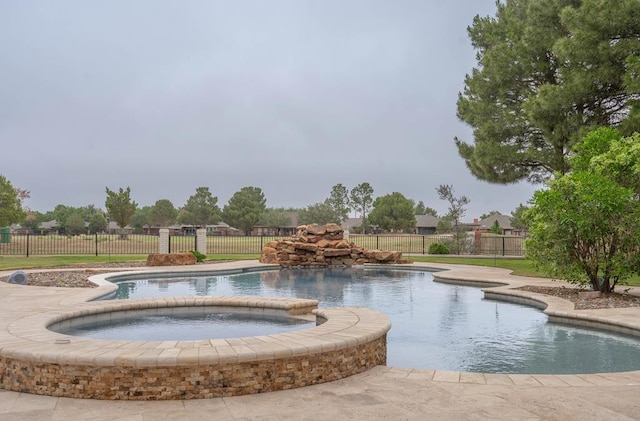 4508 Island Dr, Midland, TX 79707 - view of pool with a fenced backyard and a pool with connected hot tub