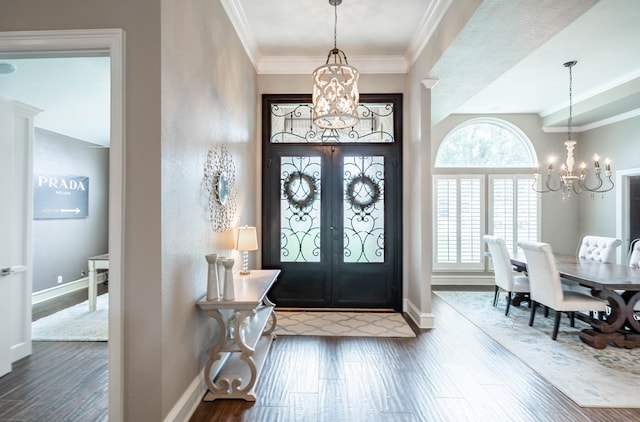 4508 Island Dr, Midland, TX 79707 - entryway featuring a chandelier, wood finished floors, baseboards, ornamental molding, and french doors