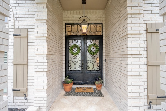 4508 Island Dr, Midland, TX 79707 - entrance to property featuring french doors and brick siding
