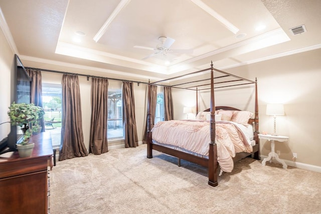 4508 Island Dr, Midland, TX 79707 - carpeted bedroom featuring a tray ceiling, ornamental molding, baseboards, and a ceiling fan