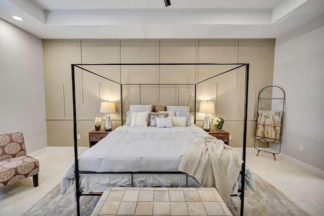 bedroom featuring light colored carpet