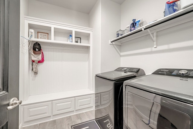 9 Senita Ct, Odessa, TX 79765 - washroom with separate washer and dryer and wood finished floors