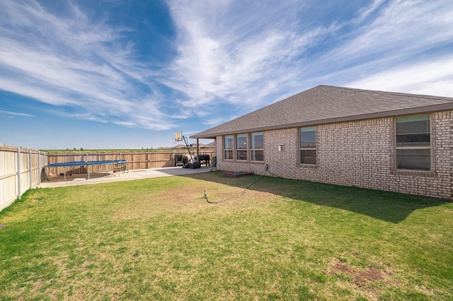 9 Senita Ct, Odessa, TX 79765 - view of yard featuring a trampoline and a patio