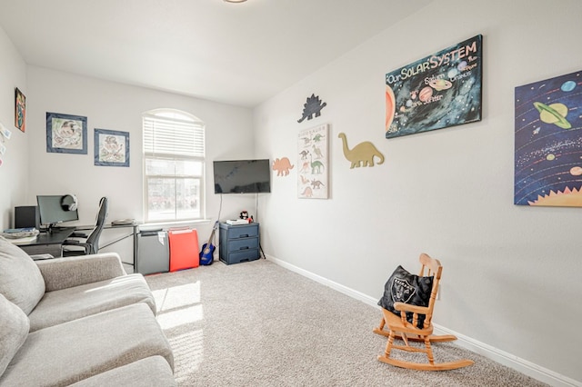 9 Senita Ct, Odessa, TX 79765 - living area featuring carpet, a desk, and baseboards