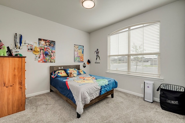 9 Senita Ct, Odessa, TX 79765 - bedroom featuring carpet floors and baseboards