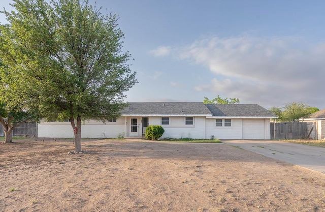 807 Boyd Ave, Midland, TX 79705 - ranch-style house featuring a garage, fence, and driveway