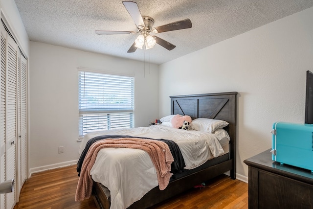 807 Boyd Ave, Midland, TX 79705 - bedroom featuring a textured ceiling, a ceiling fan, baseboards, wood finished floors, and a closet