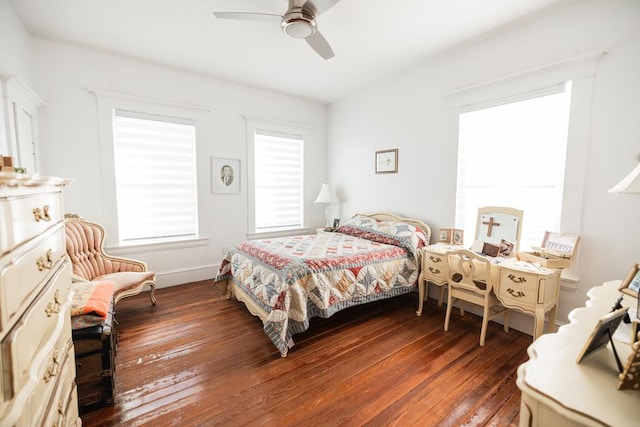 2306 32nd St, Snyder, TX 79549 - bedroom featuring ceiling fan and dark hardwood / wood-style flooring