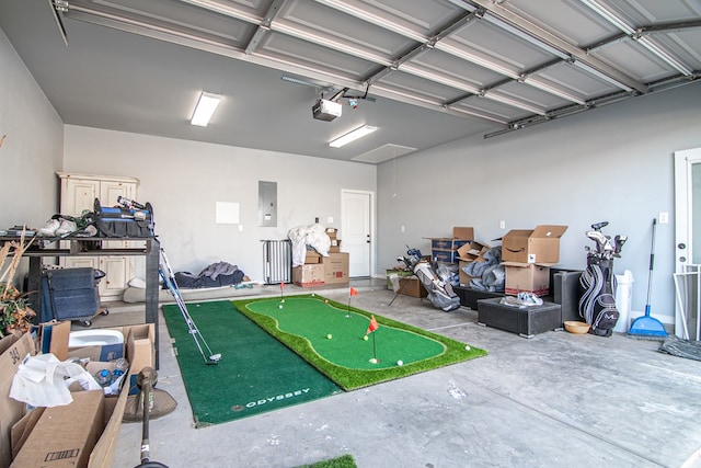 garage featuring a garage door opener and electric panel