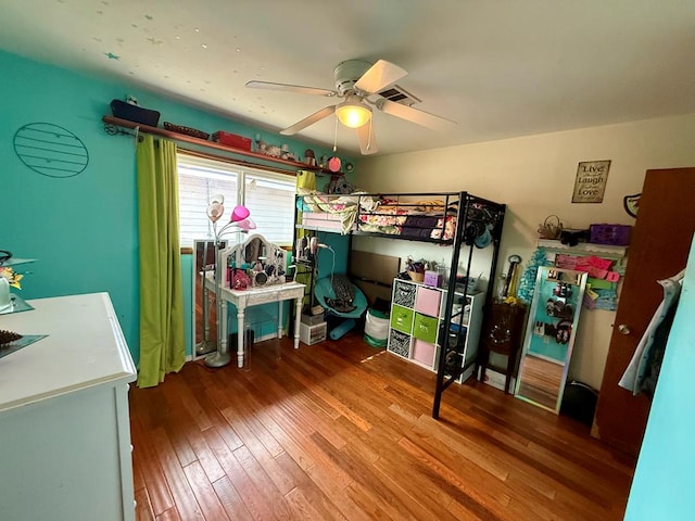 311 Kessler Ave, Midland, TX 79701 - bedroom with wood finished floors and a ceiling fan
