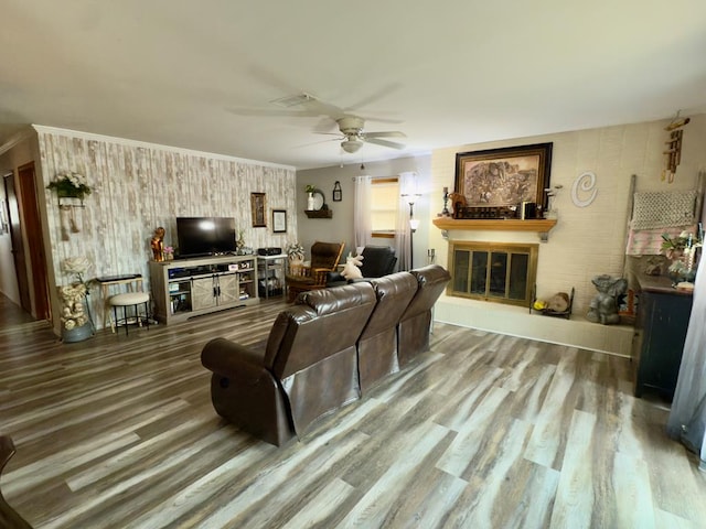 311 Kessler Ave, Midland, TX 79701 - living area with ceiling fan, wood finished floors, and a glass covered fireplace