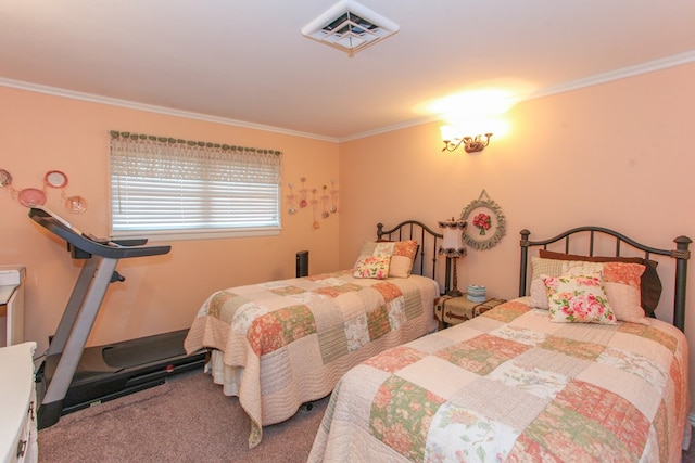 bedroom with crown molding, carpet floors, and visible vents