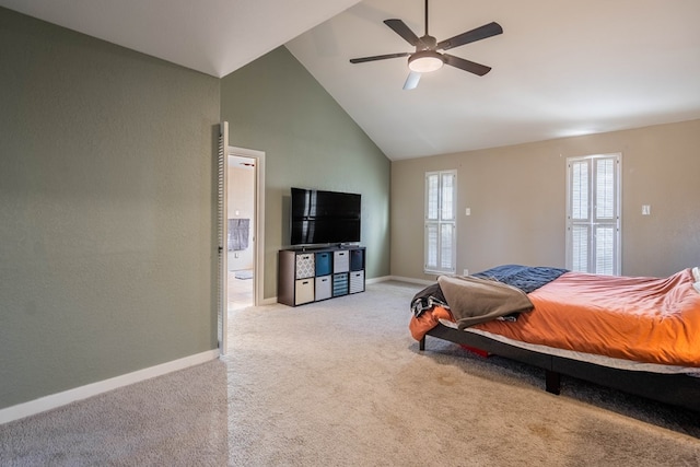 carpeted bedroom with high vaulted ceiling, baseboards, and a ceiling fan