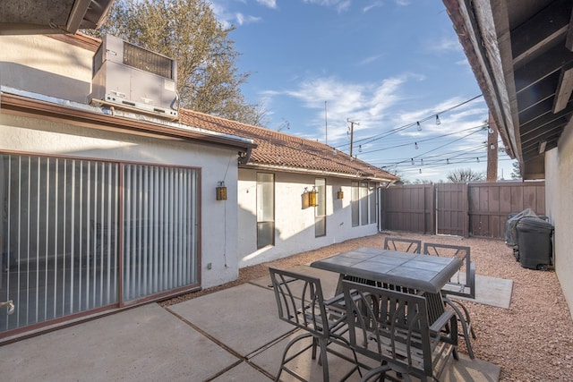 view of patio / terrace featuring outdoor dining area and a fenced backyard