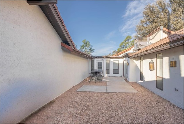 exterior space with a patio area