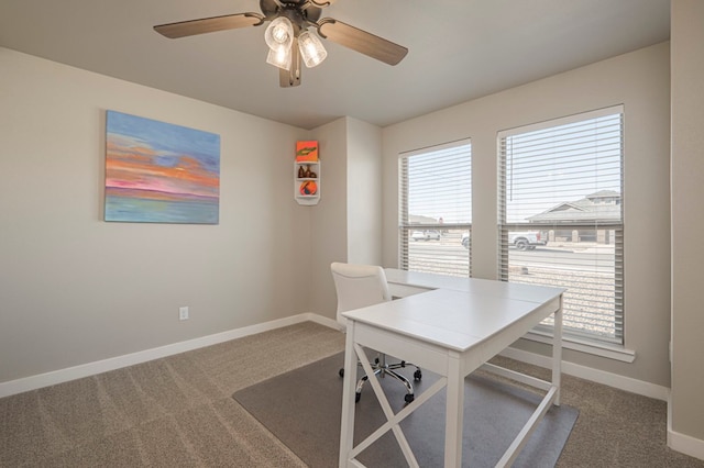 home office with carpet floors and ceiling fan