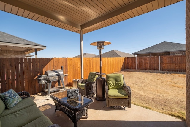 view of patio with a grill