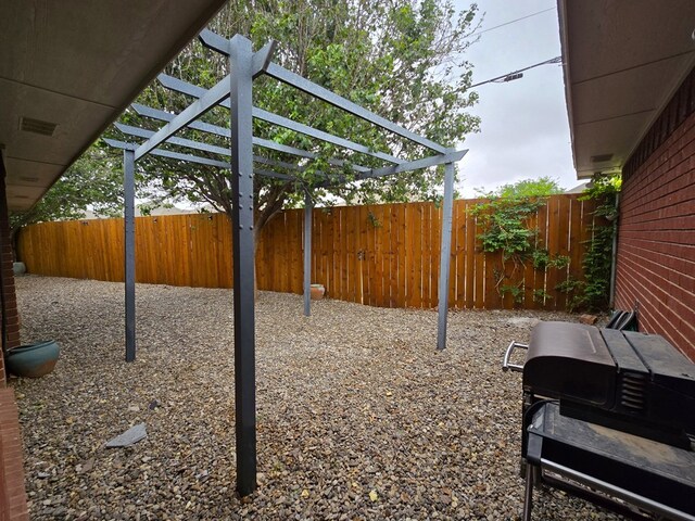 4908 Timber Ct, Midland, TX 79707 - view of yard featuring fence and a pergola