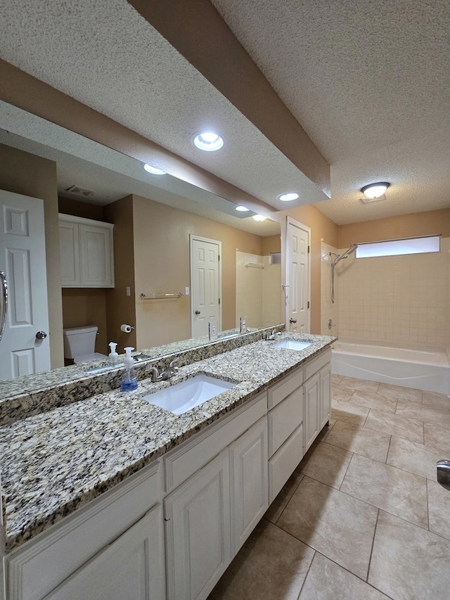 4908 Timber Ct, Midland, TX 79707 - bathroom featuring a textured ceiling, toilet, double vanity, shower / bathtub combination, and recessed lighting