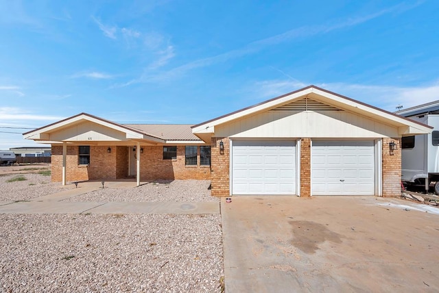 ranch-style house featuring a garage