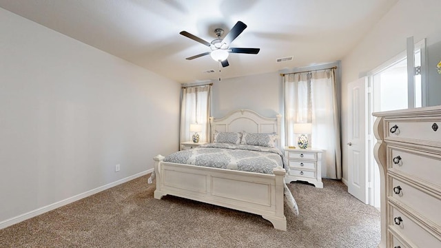 7009 Mcpherson Ln, Midland, TX 79706 - carpeted bedroom featuring ceiling fan and baseboards