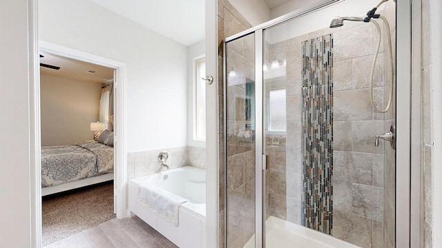 7009 Mcpherson Ln, Midland, TX 79706 - ensuite bathroom with a garden tub and a shower stall