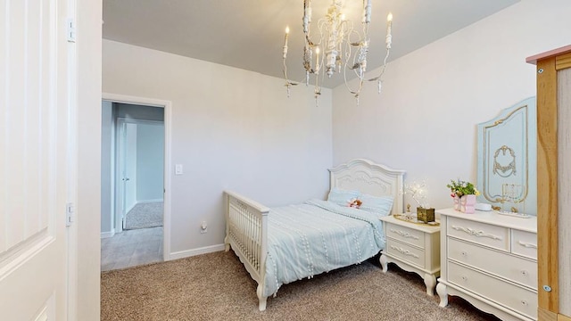 7009 Mcpherson Ln, Midland, TX 79706 - bedroom featuring carpet, a chandelier, and baseboards