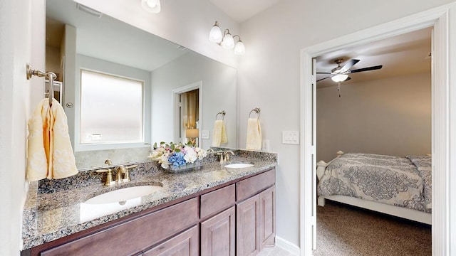7009 Mcpherson Ln, Midland, TX 79706 - ensuite bathroom featuring double vanity and ceiling fan