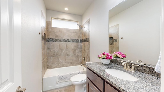 7009 Mcpherson Ln, Midland, TX 79706 - bathroom featuring toilet, vanity, and washtub / shower combination