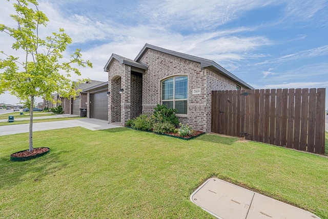 7009 Mcpherson Ln, Midland, TX 79706 - view of front of house featuring brick siding, concrete driveway, and an attached garage