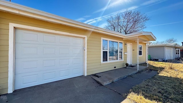 exterior space with a garage