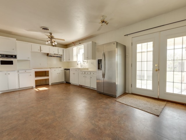 kitchen with white cabinetry, sink, ceiling fan, stainless steel appliances, and french doors