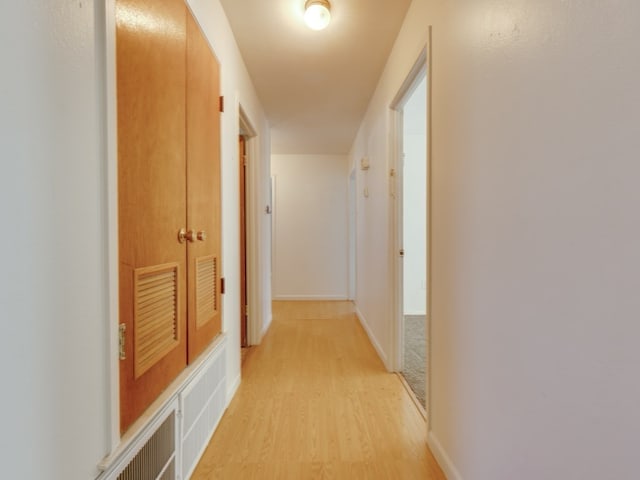 hallway featuring light hardwood / wood-style floors