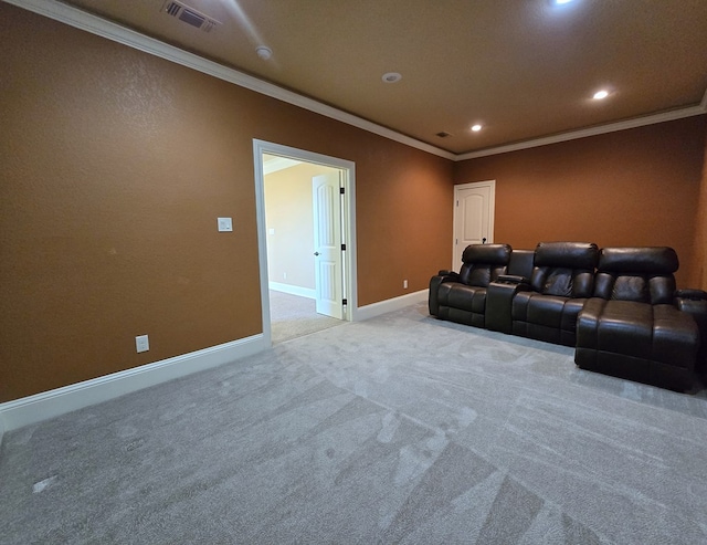 cinema featuring light colored carpet and ornamental molding