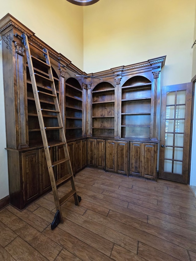 interior space with dark hardwood / wood-style flooring