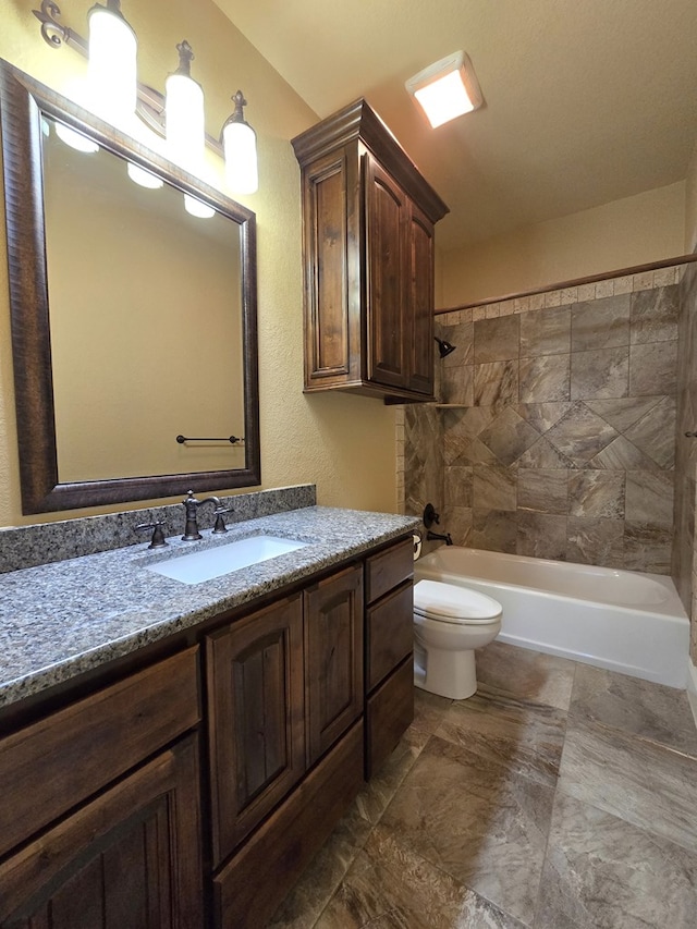 full bath with toilet, shower / washtub combination, and vanity