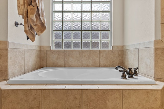 4906 Crista Ln, Midland, TX 79707 - bathroom with a garden tub