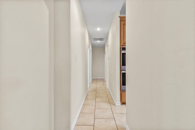 4906 Crista Ln, Midland, TX 79707 - hall with light tile patterned floors and recessed lighting
