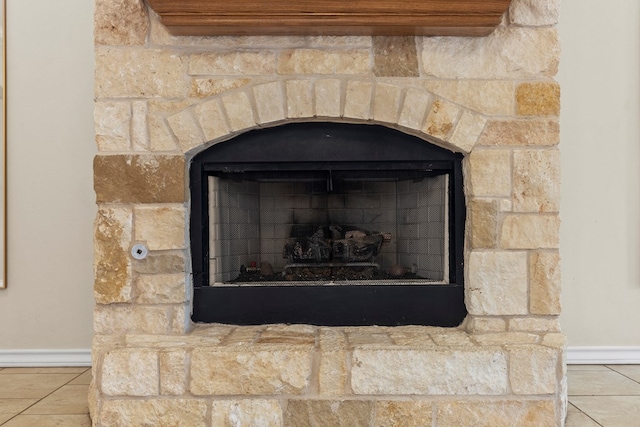 4906 Crista Ln, Midland, TX 79707 - detailed view of a stone fireplace and baseboards
