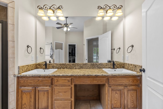 4906 Crista Ln, Midland, TX 79707 - full bathroom featuring a ceiling fan, double vanity, and tile patterned flooring