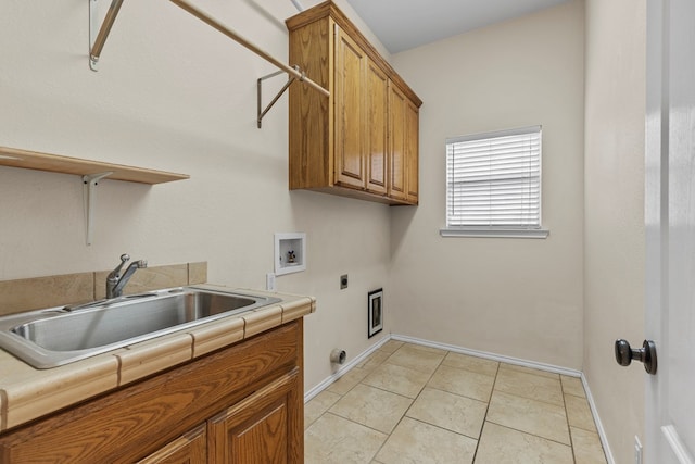 4906 Crista Ln, Midland, TX 79707 - laundry area featuring cabinet space, electric dryer hookup, hookup for a washing machine, and light tile patterned floors