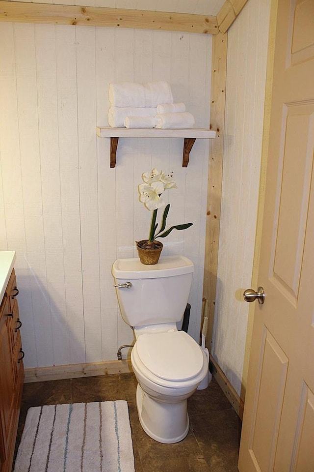 bathroom with toilet and vanity