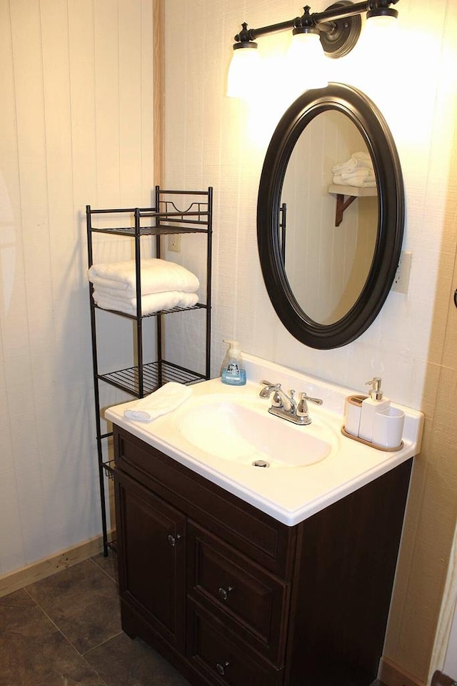 bathroom featuring tile patterned floors and vanity