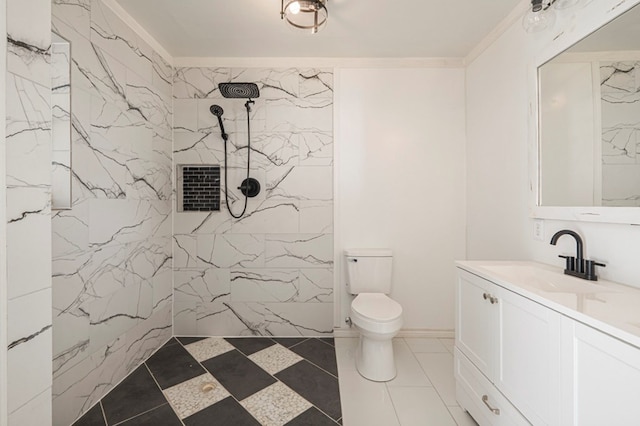 full bath featuring vanity, crown molding, toilet, and a marble finish shower