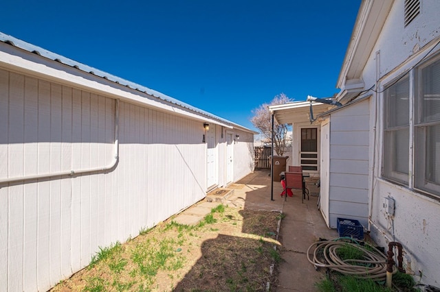 view of yard featuring a patio area and fence