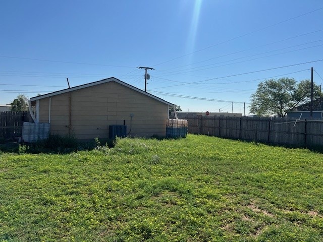 view of yard with central AC