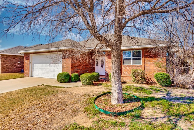 ranch-style house with brick siding, a garage, concrete driveway, and roof with shingles