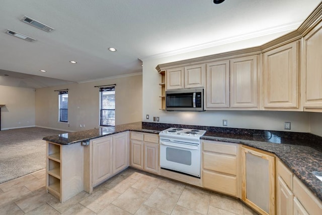 kitchen with stainless steel microwave, open shelves, white electric range, a peninsula, and open floor plan