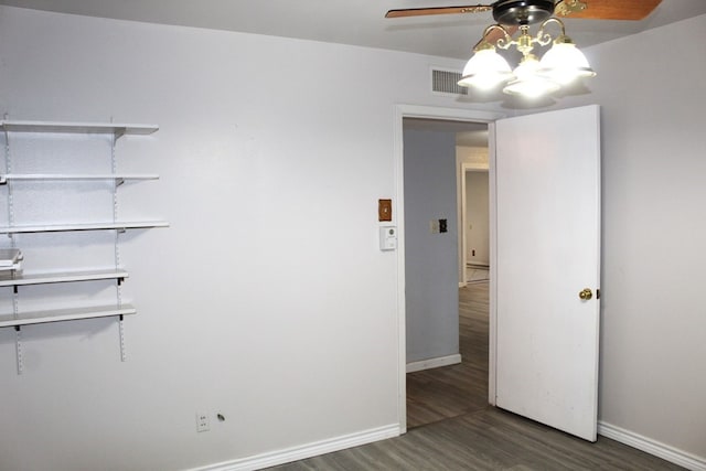 spare room featuring dark hardwood / wood-style floors