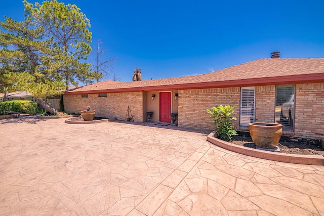 back of house featuring a patio